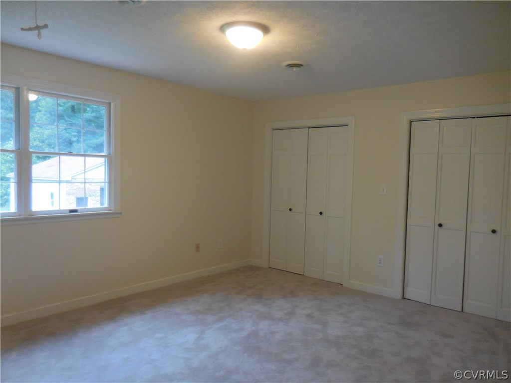15206 Harrowgate Road Chester, VA 23831 - Photo 14 of 19 an empty room with a window
