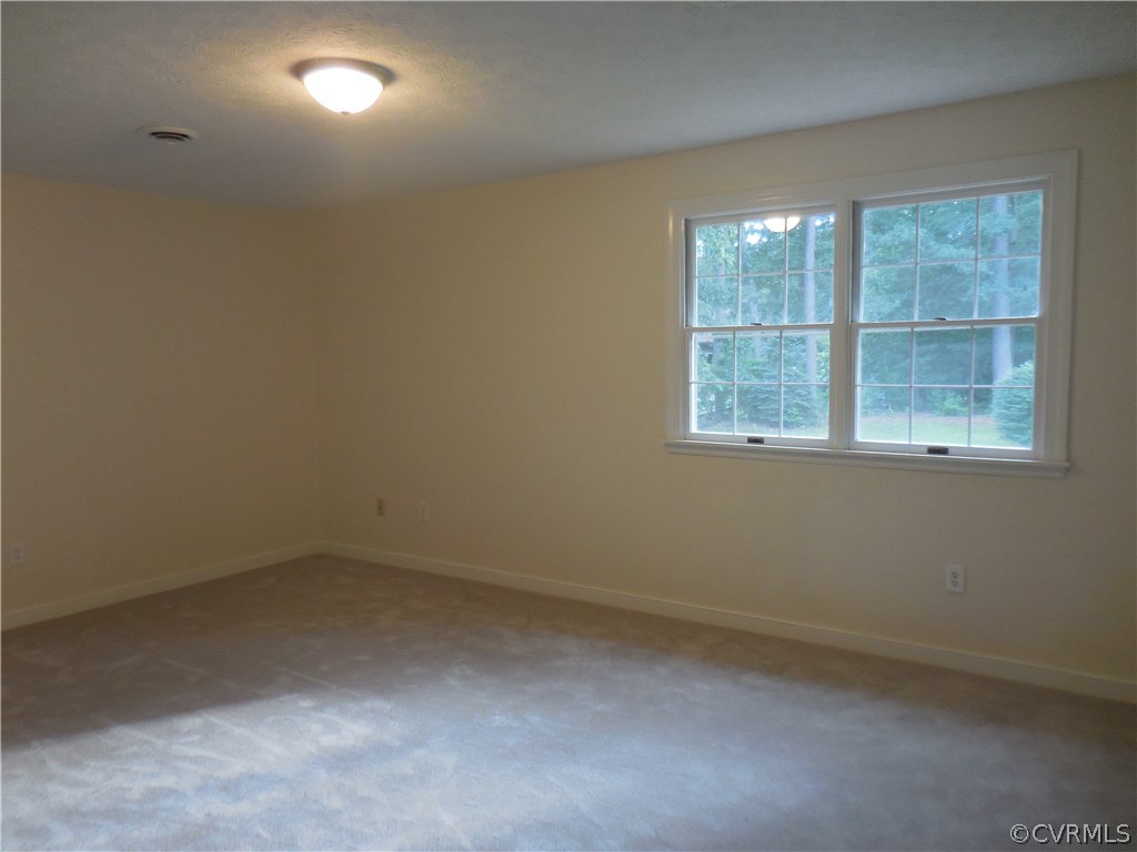 15206 Harrowgate Road Chester, VA 23831 - Photo 15 of 19 an empty room with a window