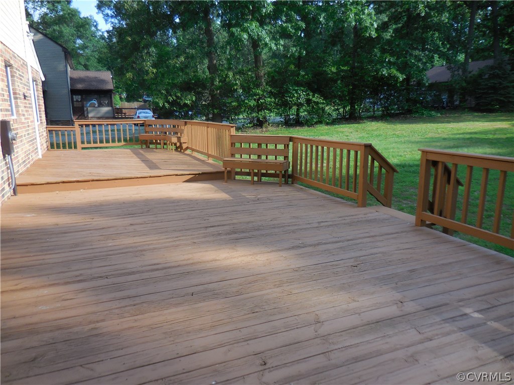 15206 Harrowgate Road Chester, VA 23831 - Photo 17 of 19 a view of a deck with a yard
