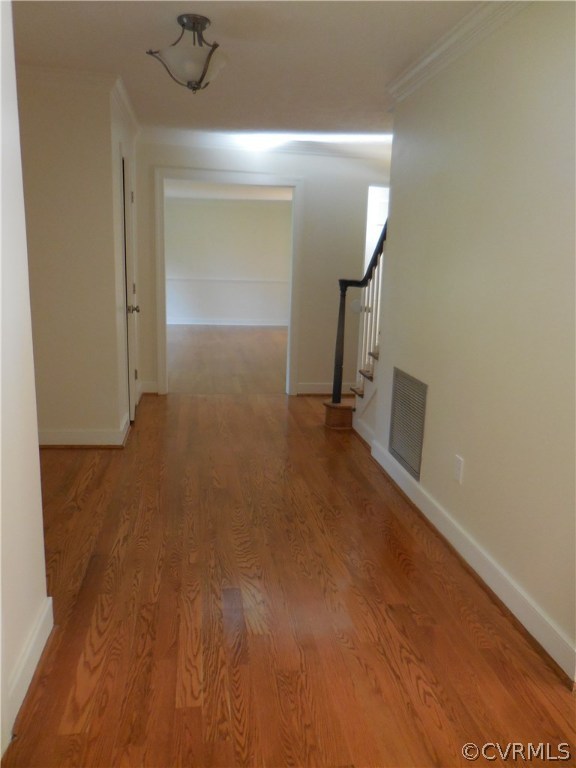 15206 Harrowgate Road Chester, VA 23831 - Photo 2 of 19 a view of a hallway with wooden floor