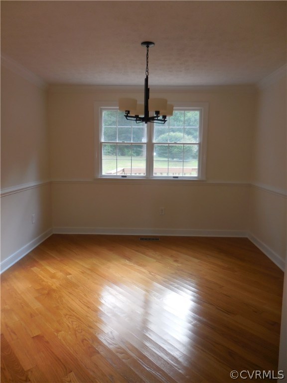 15206 Harrowgate Road Chester, VA 23831 - Photo 5 of 19 a view of room with window and hardwood floor