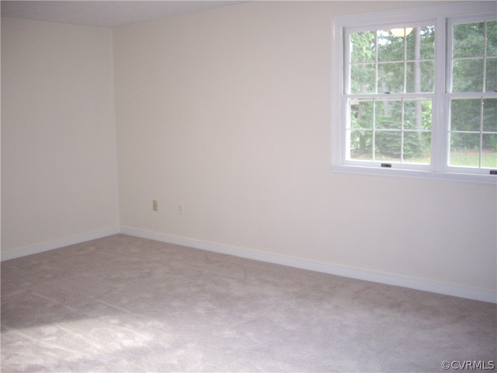 15206 Harrowgate Road Chester, VA 23831 - Photo 10 of 19 an empty room with a window