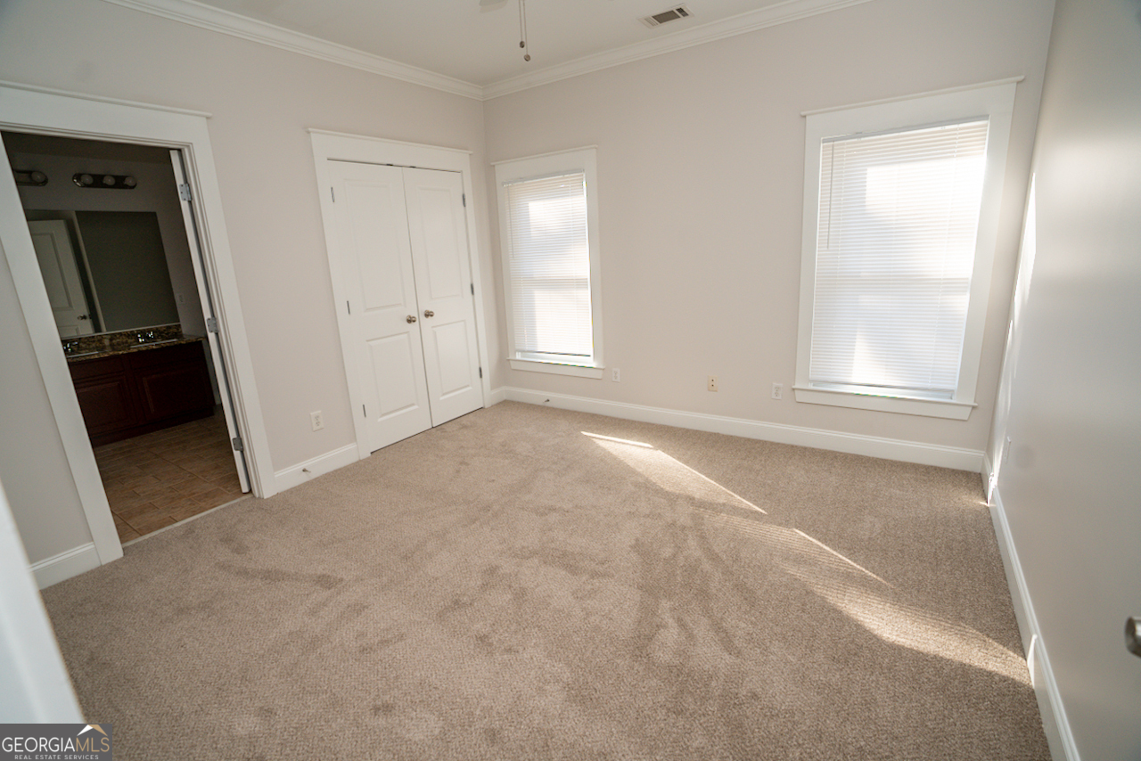 901 Custer Avenue Southeast Atlanta, GA 30315 - Photo 13 of 21 an empty room with windows