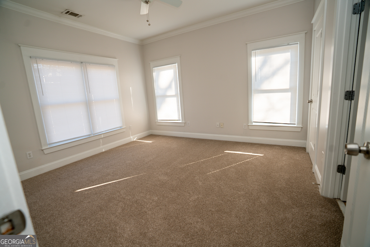 901 Custer Avenue Southeast Atlanta, GA 30315 - Photo 14 of 21 an empty room with windows