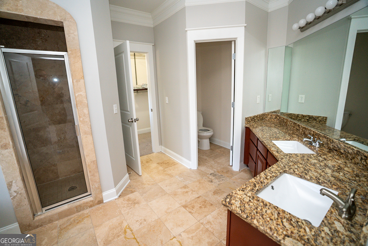 901 Custer Avenue Southeast Atlanta, GA 30315 - Photo 18 of 21 a spacious bathroom with a granite countertop sink and a mirror