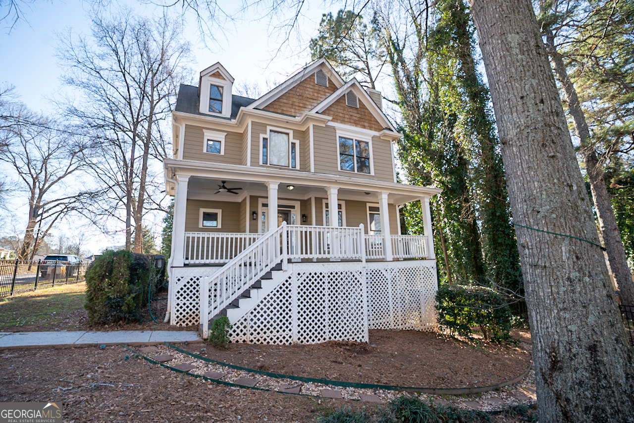 901 Custer Avenue Southeast Atlanta, GA 30315 - Photo 2 of 21 a front view of a house with a garden