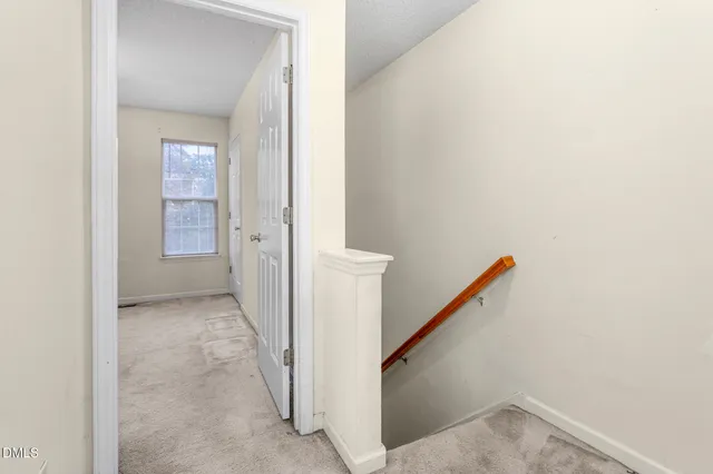 a view of a hallway with entryway