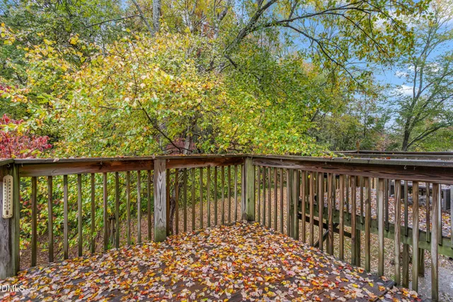 a balcony with trees