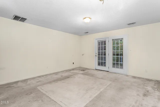 a view of a room with windows