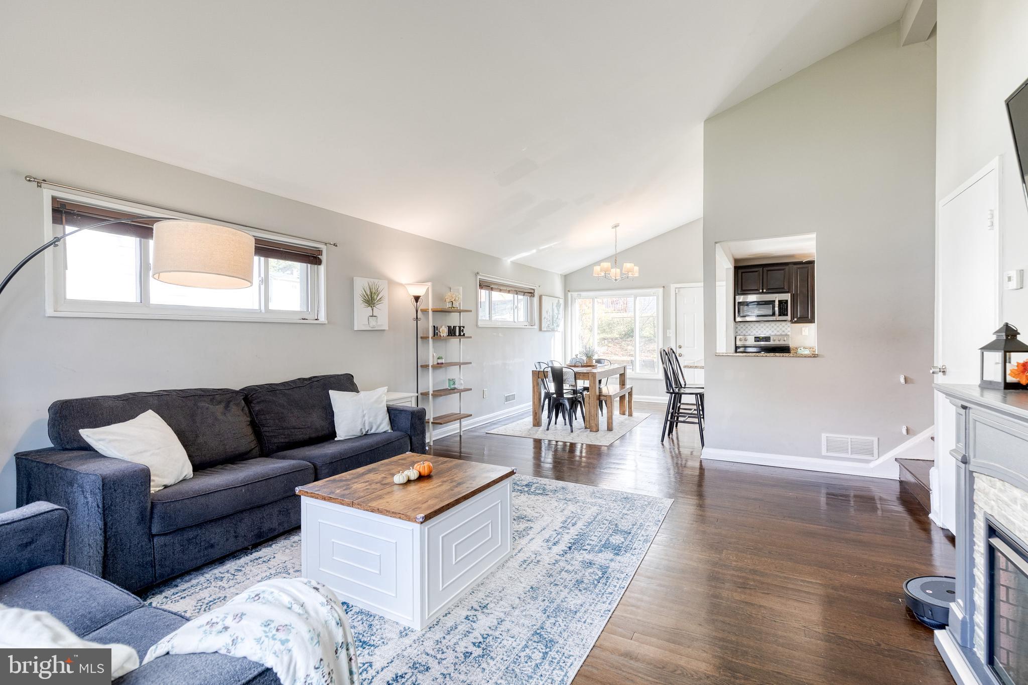 913 Marksworth Road Catonsville, MD 21228 - Photo 2 of 36 a living room with furniture and wooden floor