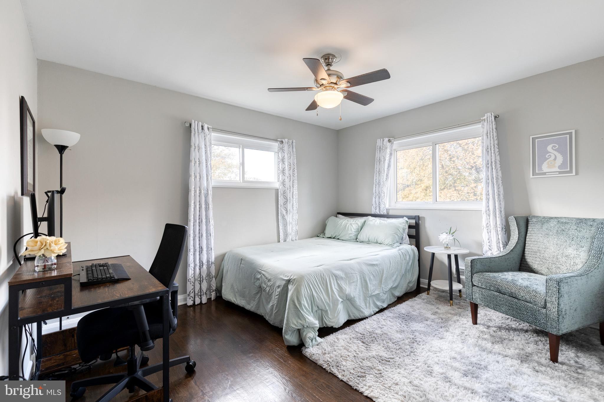 913 Marksworth Road Catonsville, MD 21228 - Photo 21 of 36 a bedroom with a bed and a window
