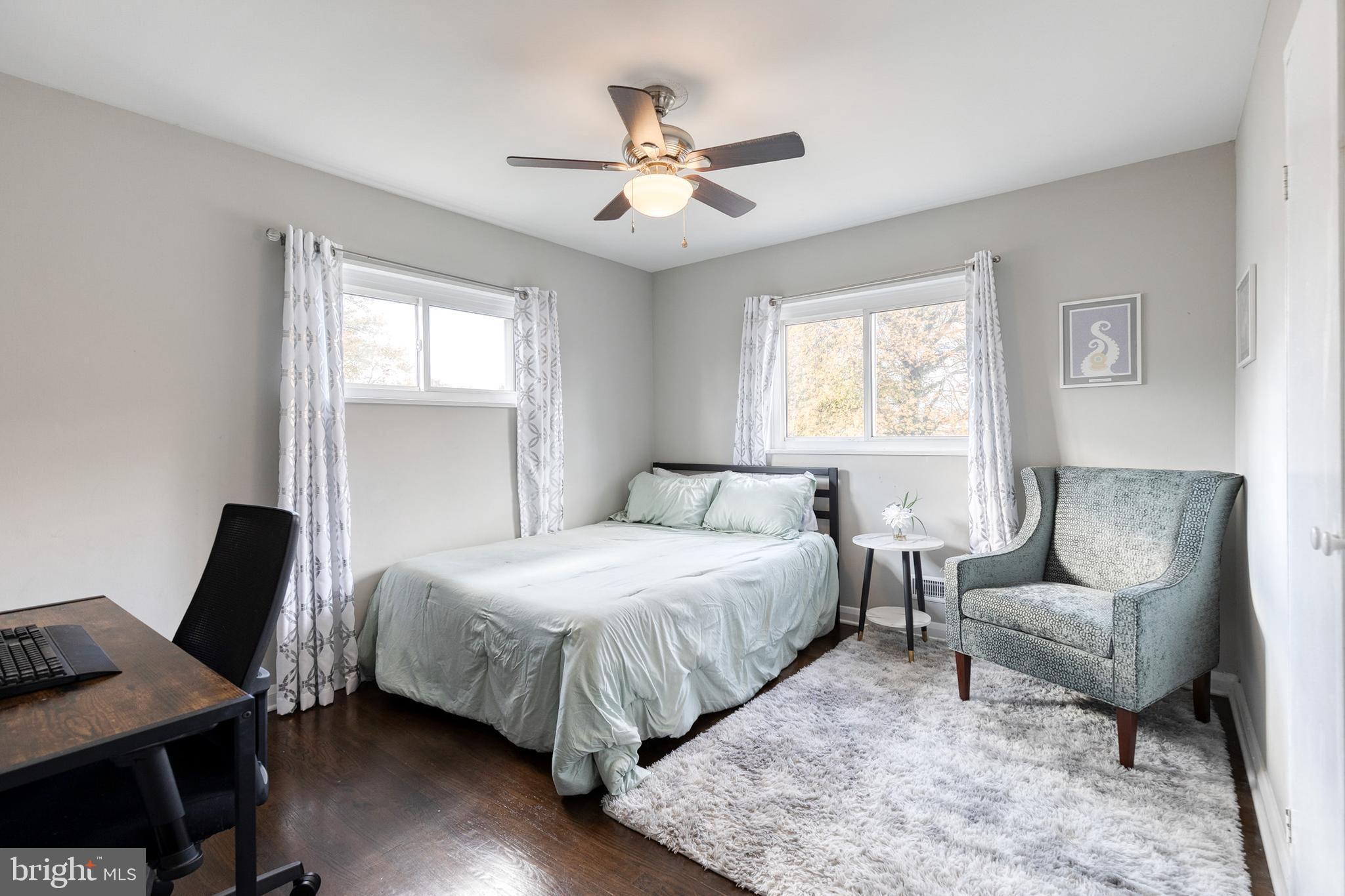 913 Marksworth Road Catonsville, MD 21228 - Photo 22 of 36 a bedroom with a bed and a couch