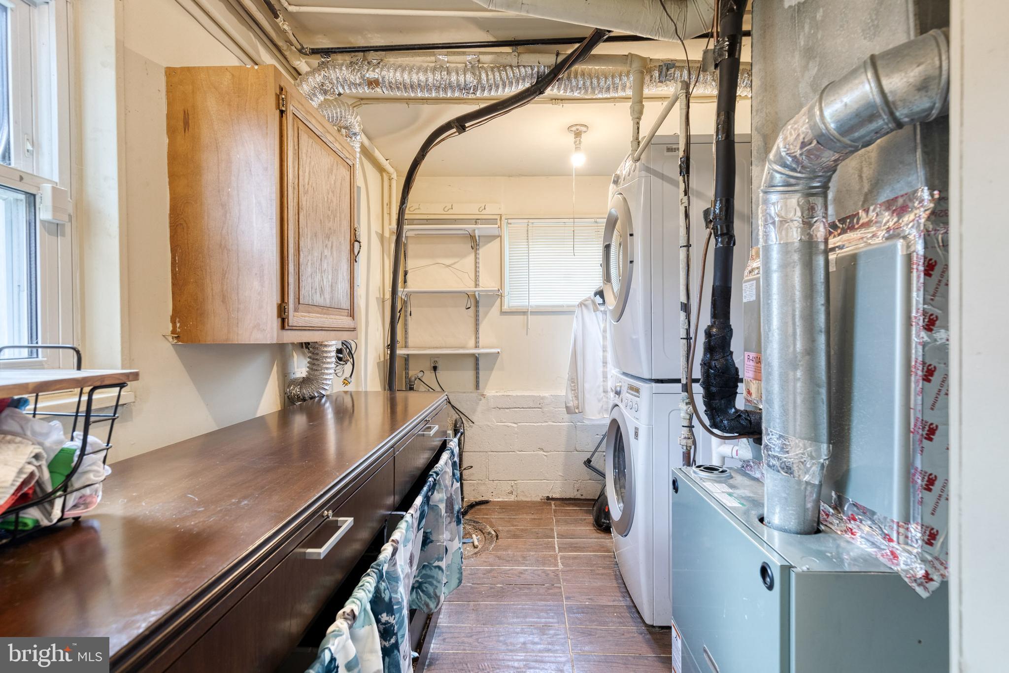 913 Marksworth Road Catonsville, MD 21228 - Photo 30 of 36 a bathroom with a sink a mirror and shower