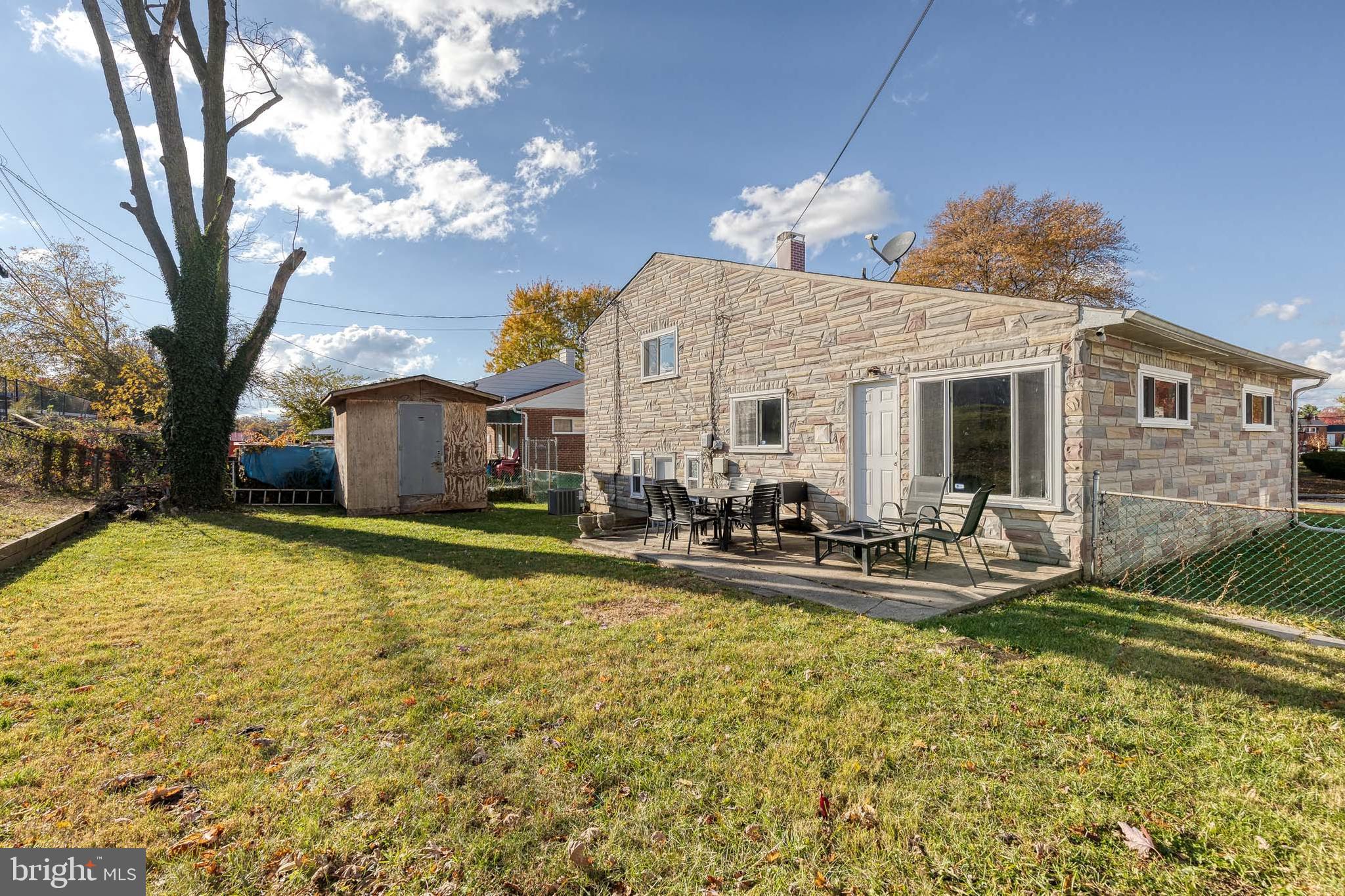 913 Marksworth Road Catonsville, MD 21228 - Photo 33 of 36 a front view of house with yard and seating space