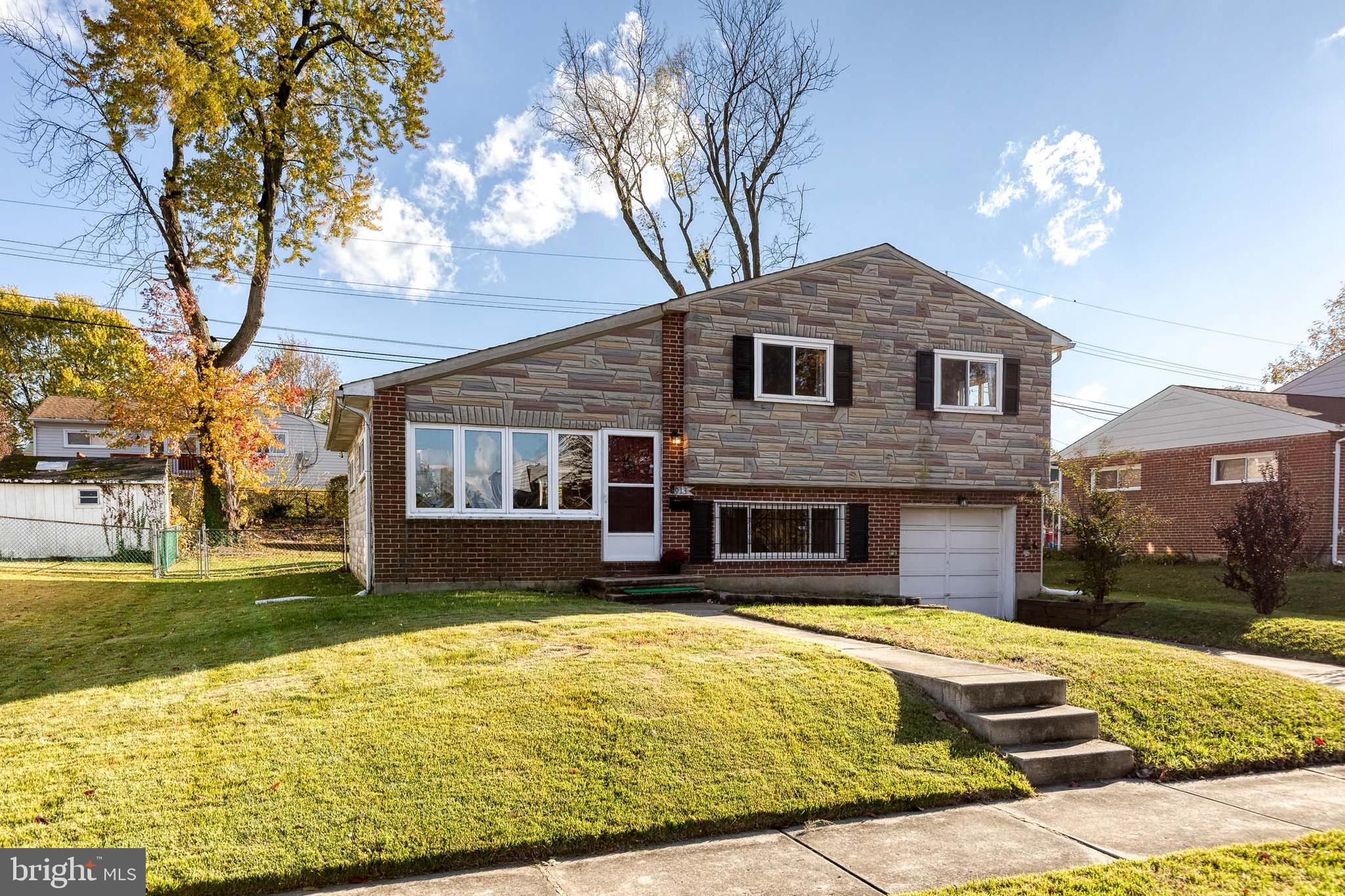 913 Marksworth Road Catonsville, MD 21228 - Photo 36 of 36 a front view of a house with a yard