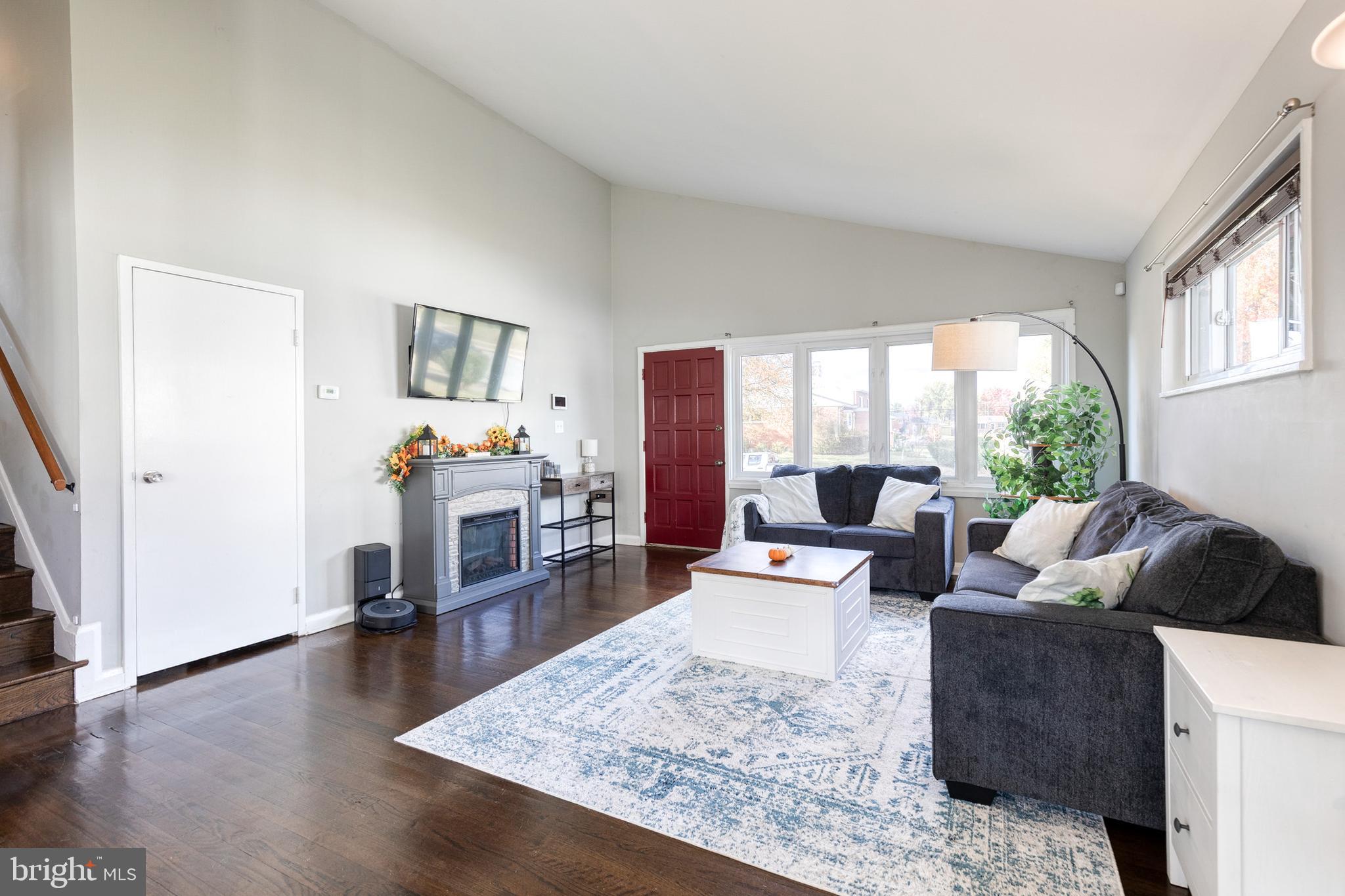 913 Marksworth Road Catonsville, MD 21228 - Photo 4 of 36 a living room with furniture and a wooden floor