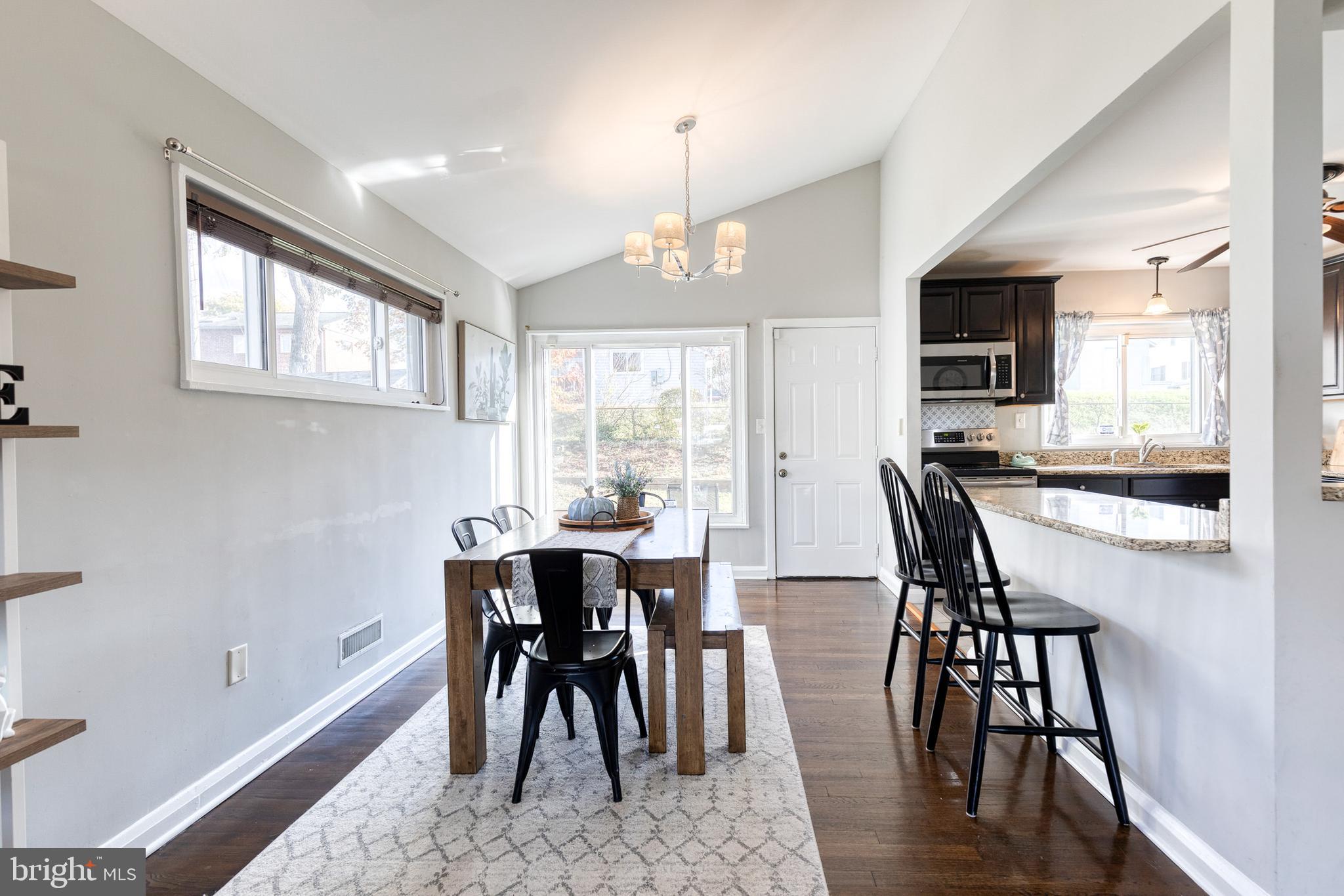 913 Marksworth Road Catonsville, MD 21228 - Photo 8 of 36 a view of a dining room with furniture window and wooden floor
