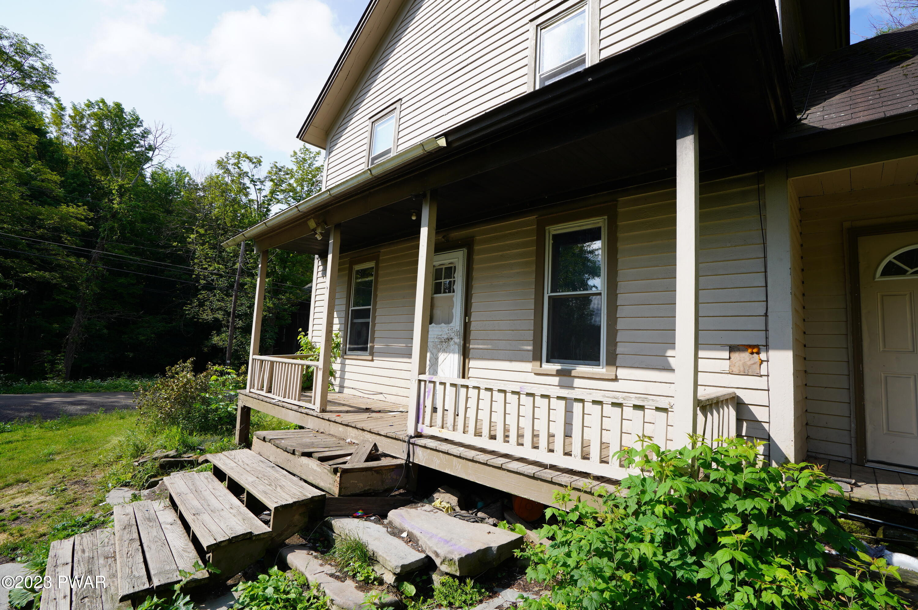 147 Daniels Road Lake Ariel, PA 18436 - Photo 24 of 25 front view of a house with a garden