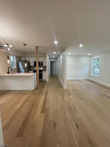 a view of a kitchen with a sink