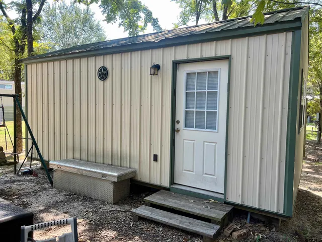 a house view with a backyard space