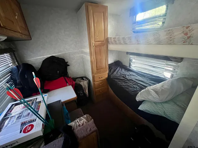 a side view of a house with yard