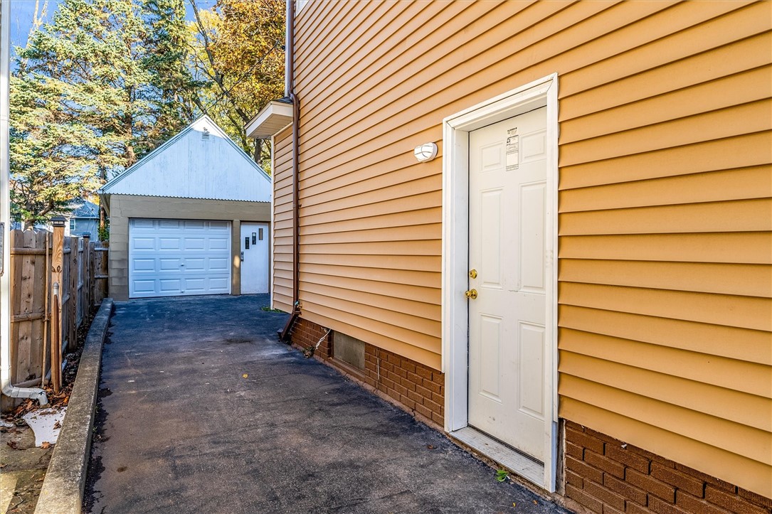 770 Genesee Park Boulevard Rochester, NY 14619 - Photo 41 of 48 Side Door Garage