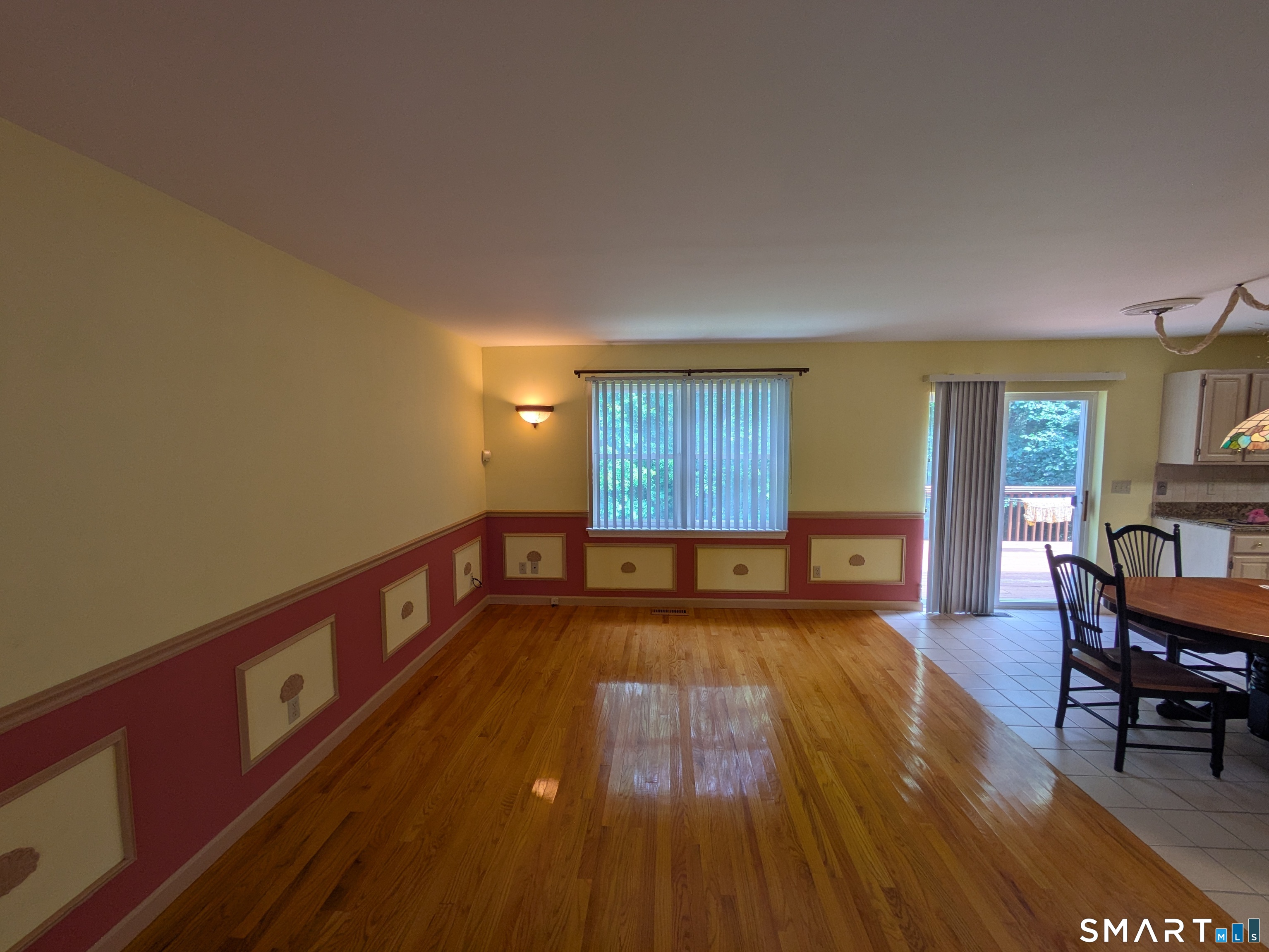61 Basking Brook Road Shelton, CT 06484 - Photo 14 of 25 a room with wooden floor and furniture