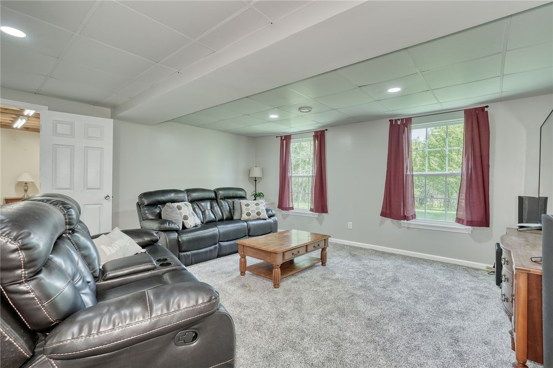 32 Ashlyn Rise Penfield, NY 14450 - Photo 41 of 50 Family room with new carpeting.
