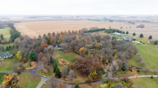 an aerial view of residential house with outdoor space