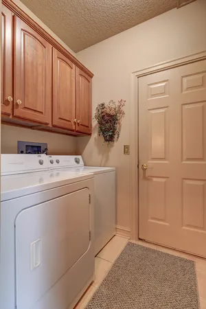 a bedroom with a large bed and a large window