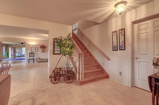a bedroom with double bed and window