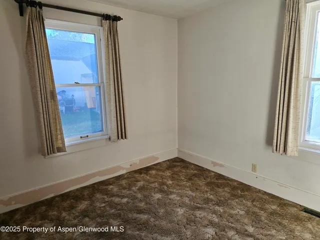 an empty room with closet