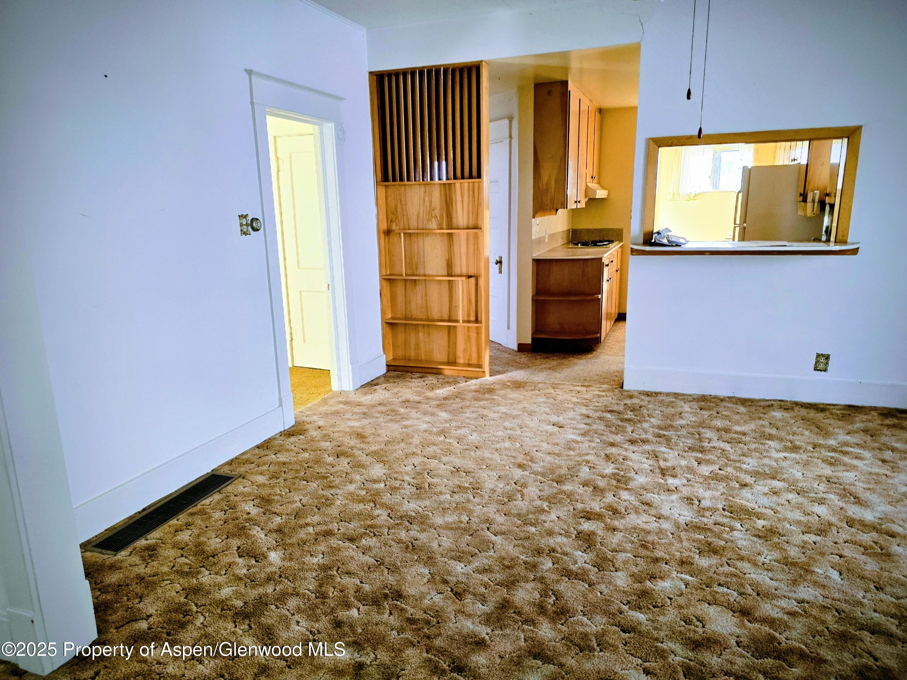 720 Barclay Street Craig, CO 81625 - Photo 19 of 22 a bedroom with window