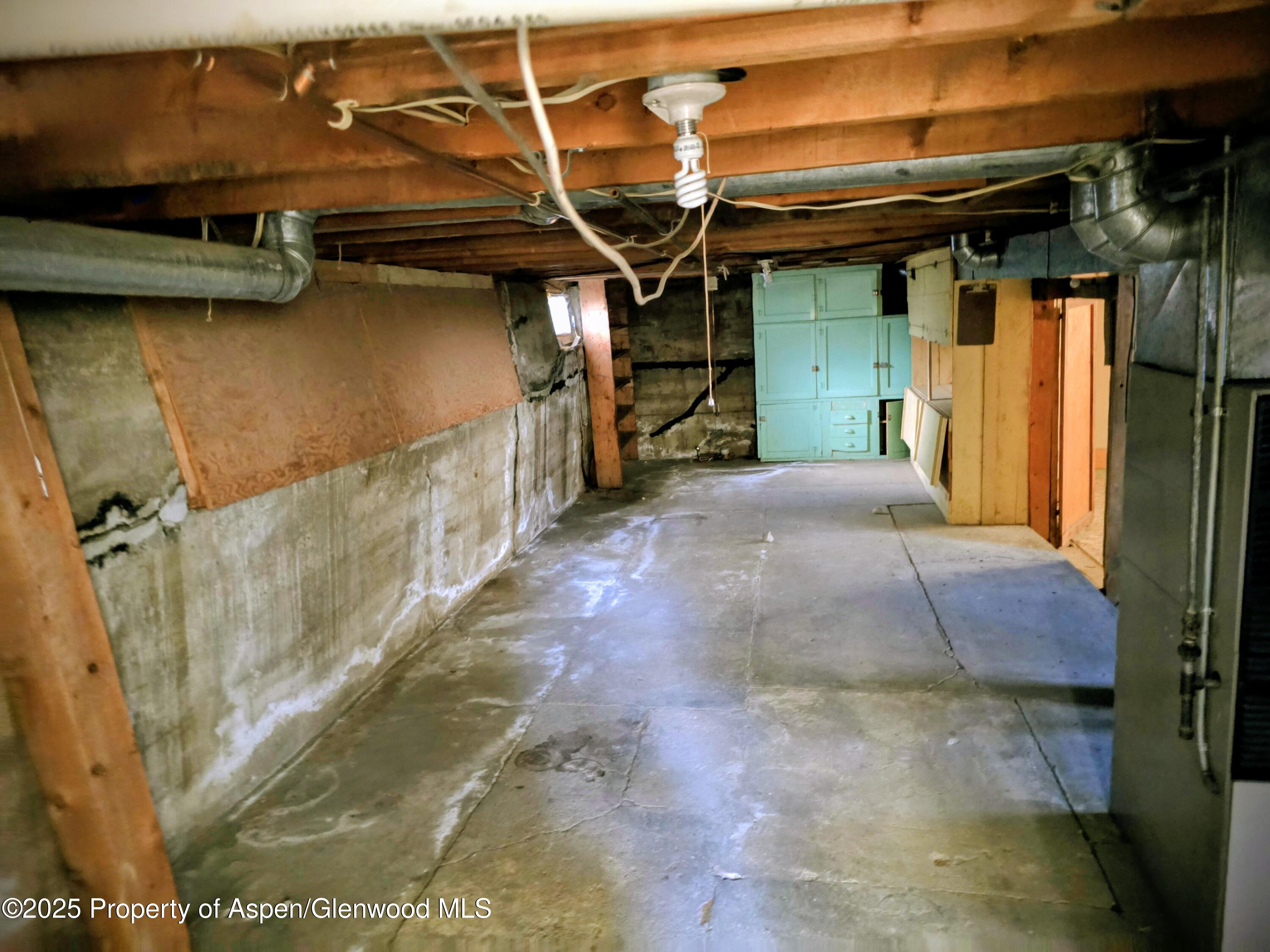 720 Barclay Street Craig, CO 81625 - Photo 21 of 22 a view of storage and utility room