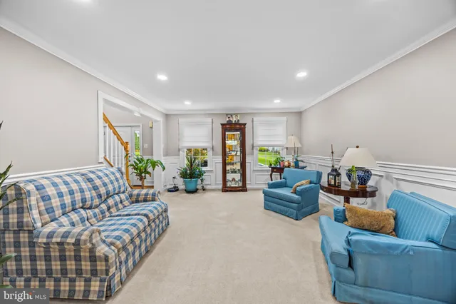 a view of entryway with wooden floor and a potted plant