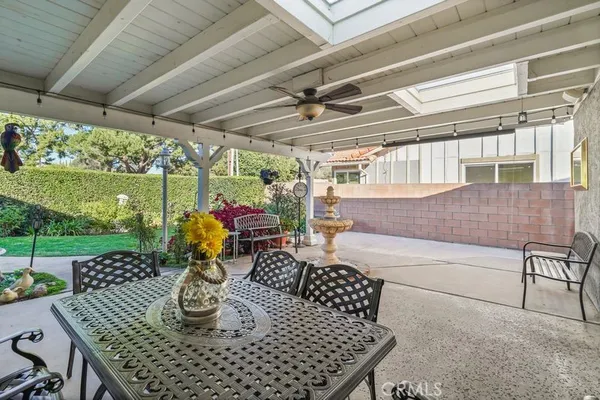 a outdoor dining space with furniture
