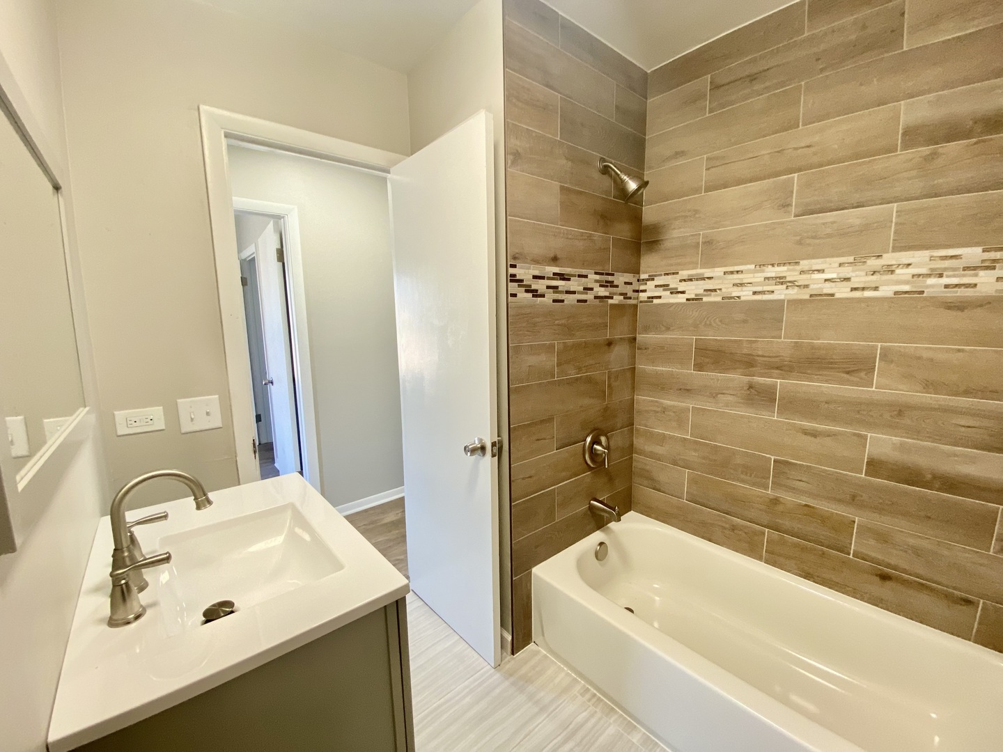 5543 West Margaret Street, Unit B Monee, IL 60449 - Photo 11 of 11 a bathroom with a sink tub shower and a mirror