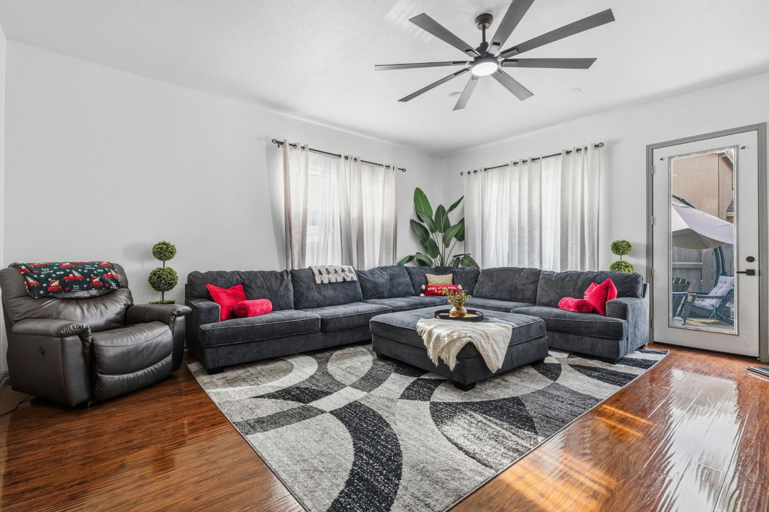 4215 Riopel Avenue Denair, CA 95316 - Photo 14 of 62 a living room with furniture and a couch