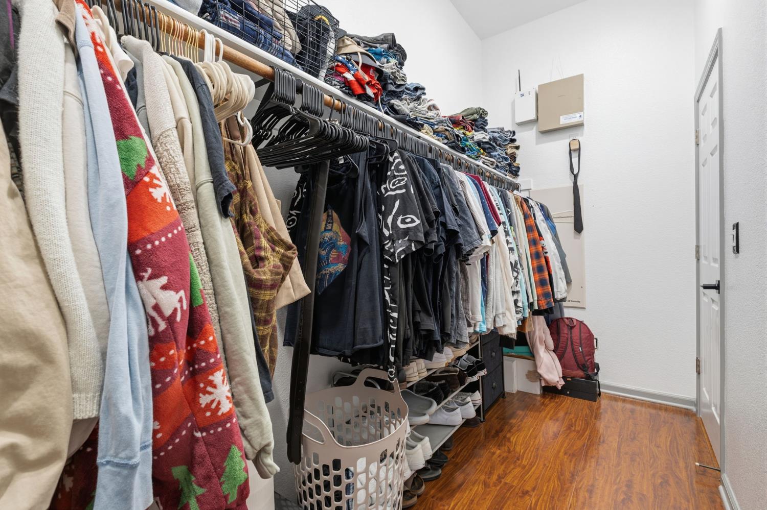 4215 Riopel Avenue Denair, CA 95316 - Photo 25 of 62 a view of walk in closet with clothes and shoes
