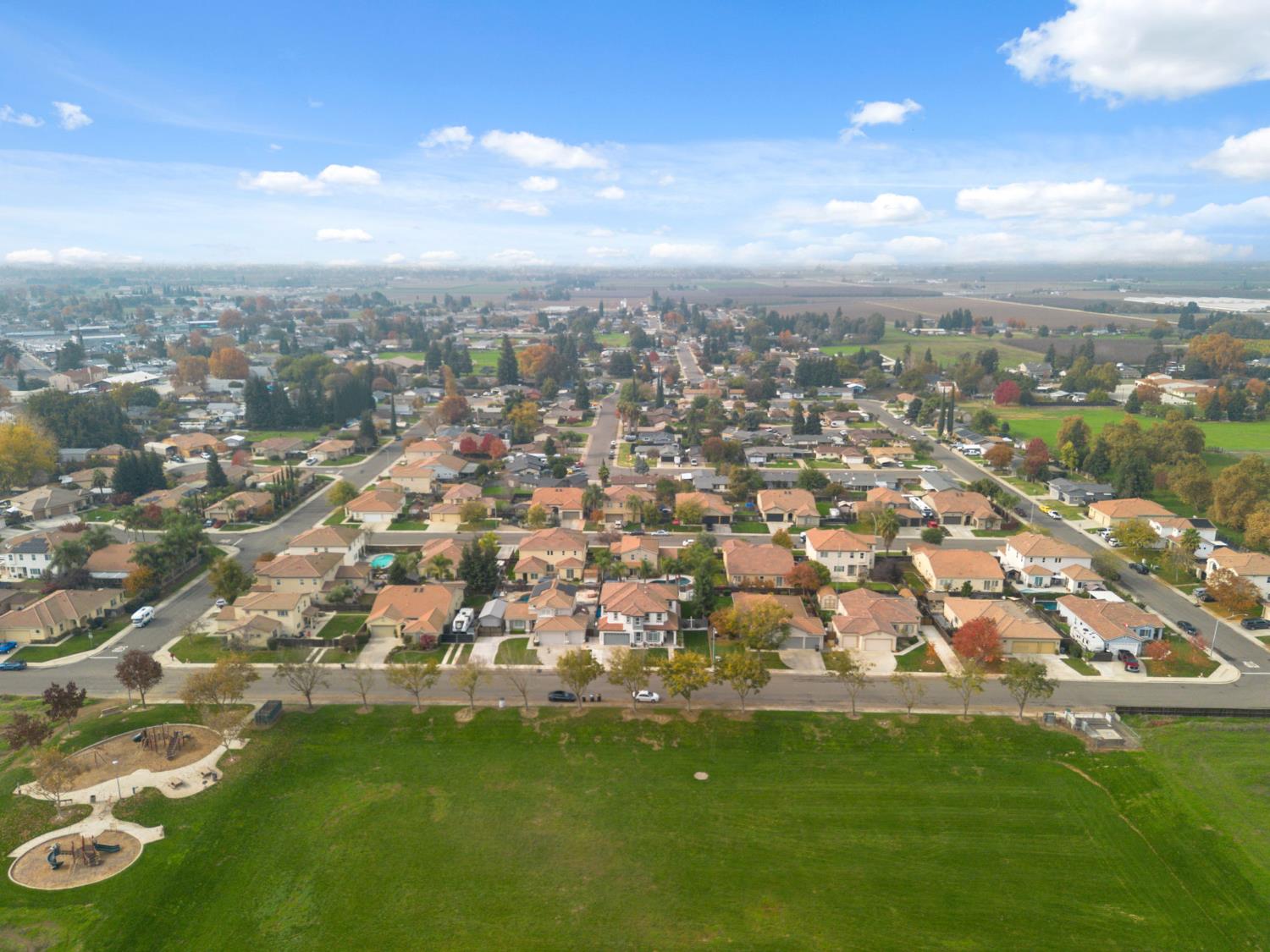 4215 Riopel Avenue Denair, CA 95316 - Photo 49 of 62 an aerial view of residential houses with outdoor space