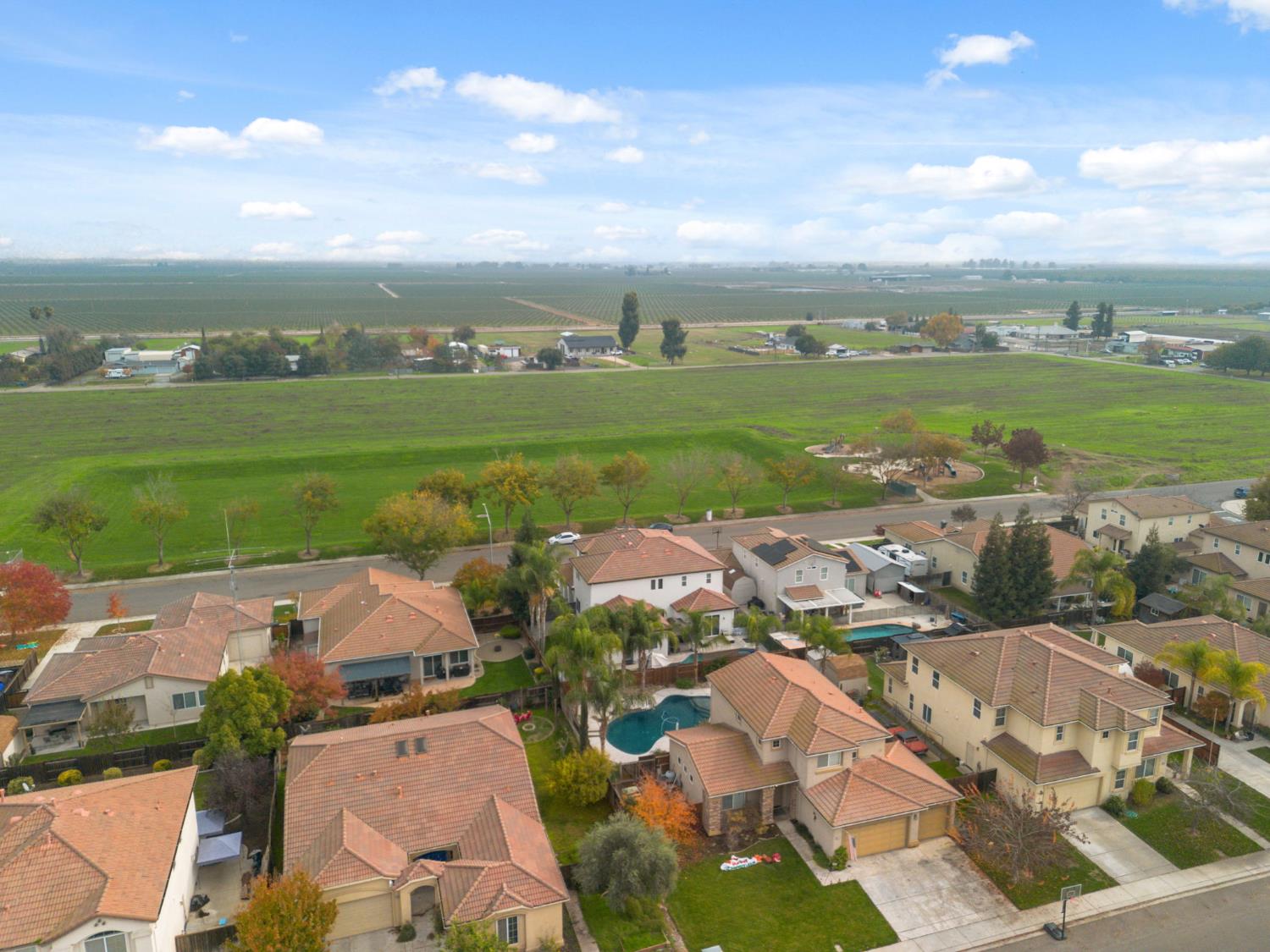 4215 Riopel Avenue Denair, CA 95316 - Photo 53 of 62 an aerial view of residential houses with outdoor space and ocean view