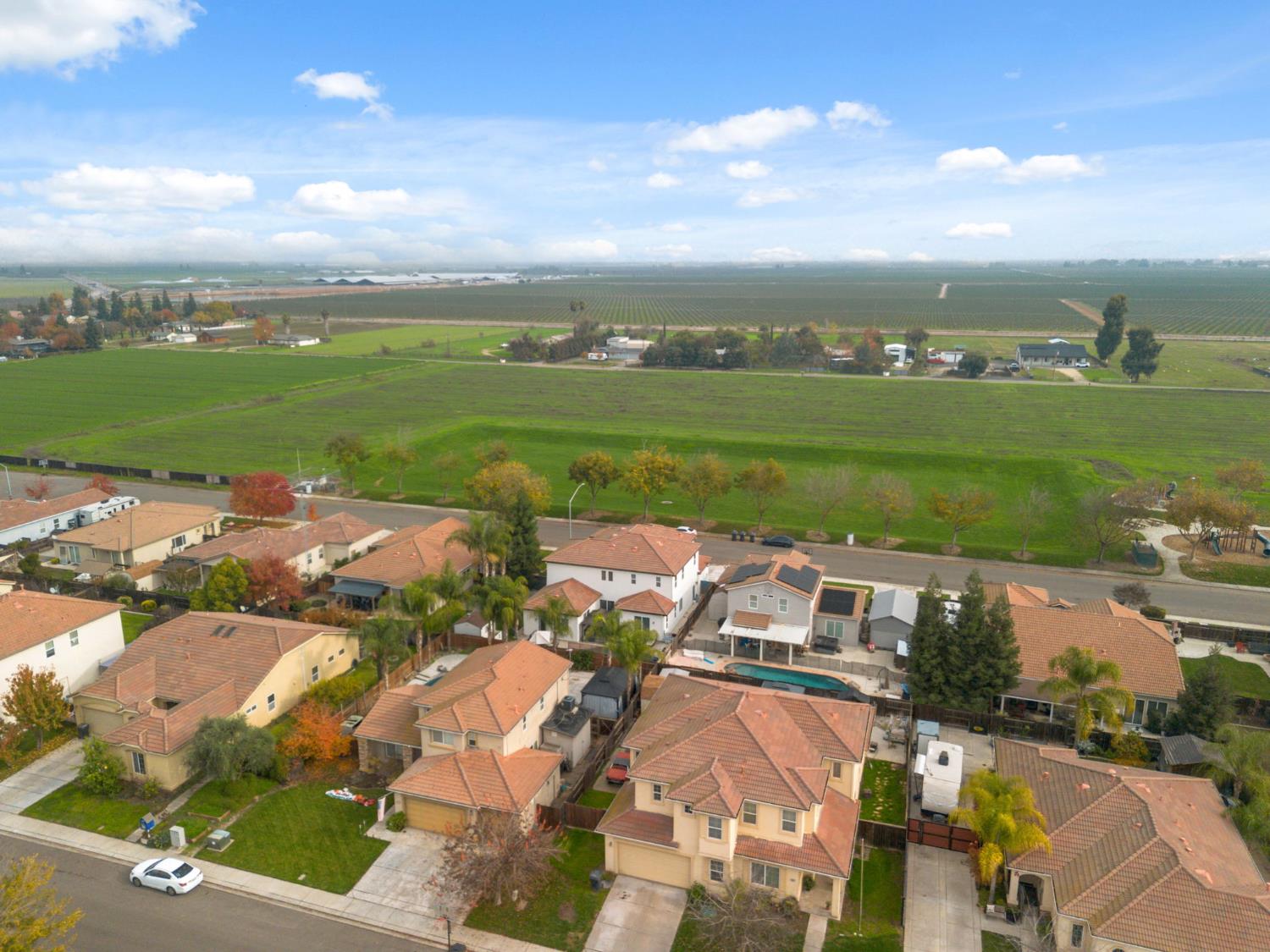 4215 Riopel Avenue Denair, CA 95316 - Photo 54 of 62 an aerial view of residential houses with outdoor space and ocean view