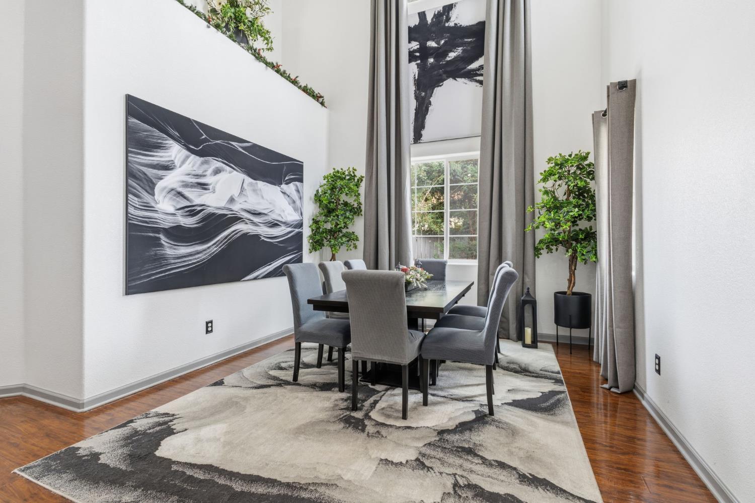 4215 Riopel Avenue Denair, CA 95316 - Photo 6 of 62 a view of a dining room with furniture window and wooden floor