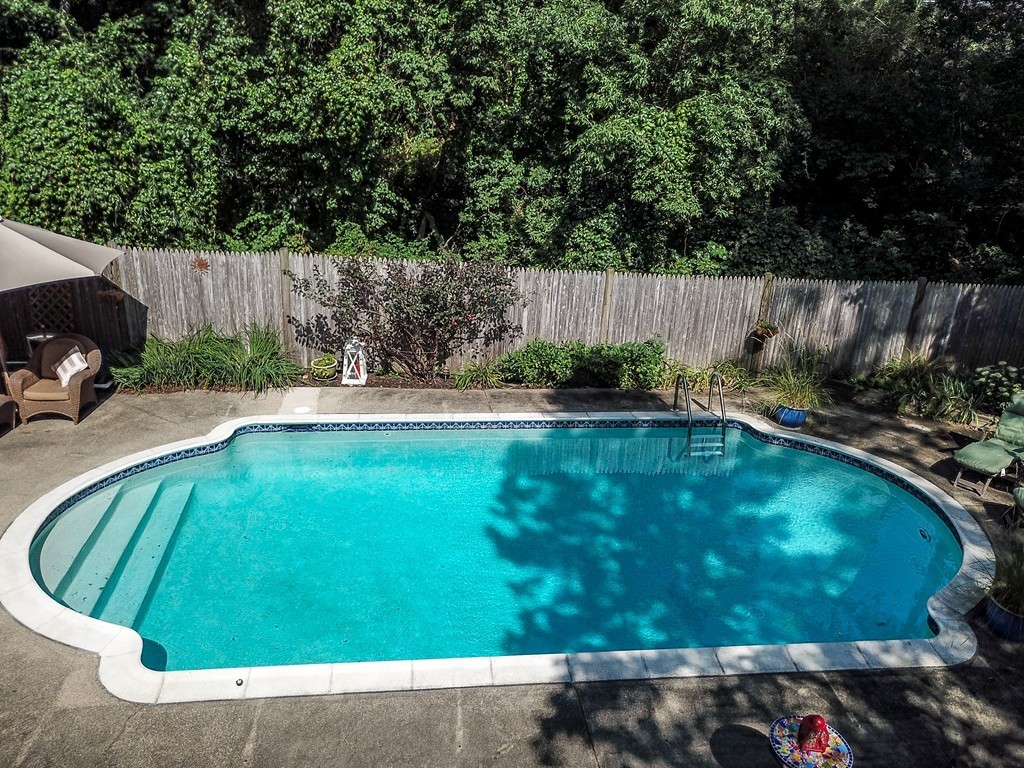 61 Volk Road Dedham, MA 02026 - Photo 15 of 26 a view of a back yard