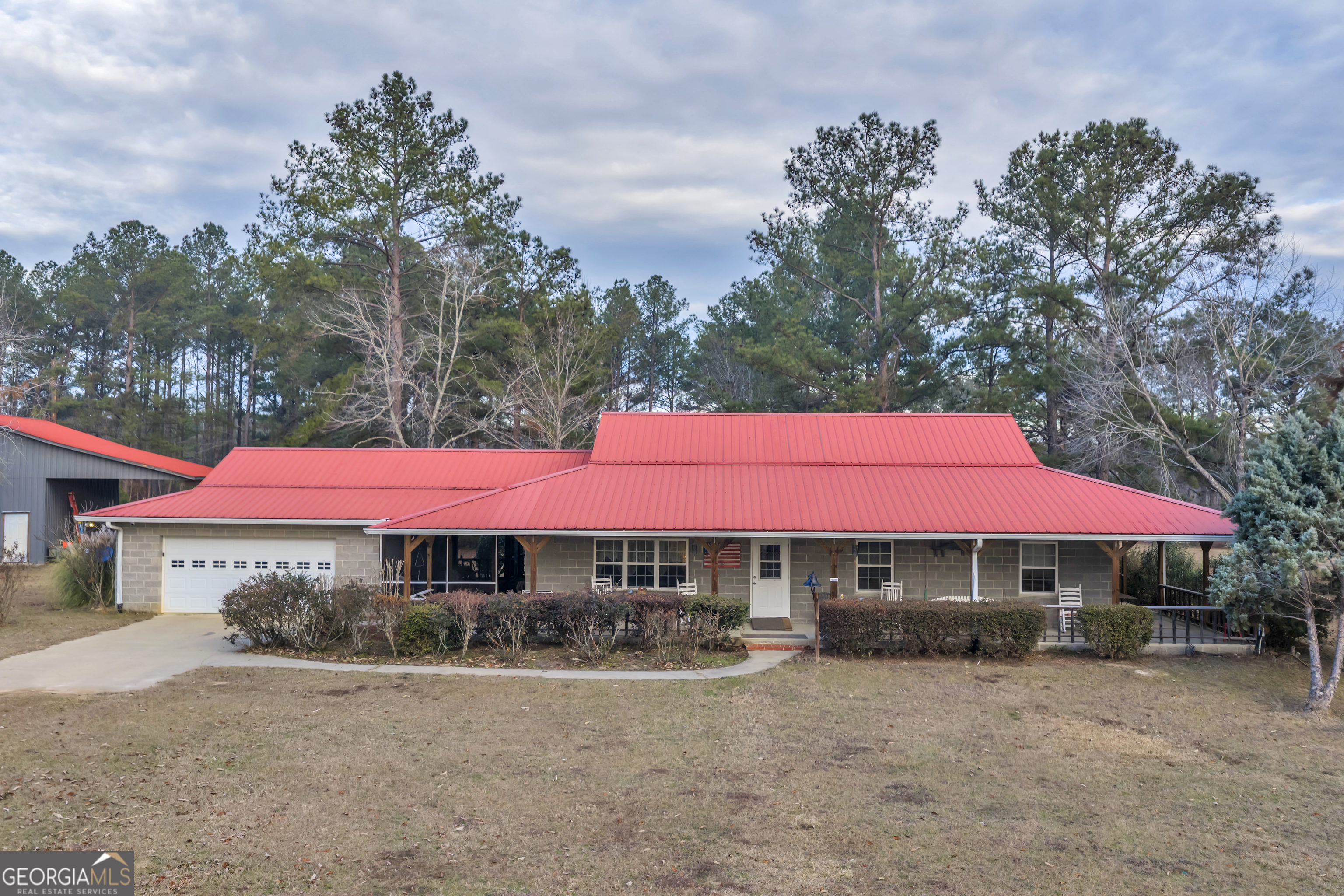 241 Foskey Cemetery Road Adrian, GA 31002 - Photo 12 of 95 a front view of a house with yard and trees