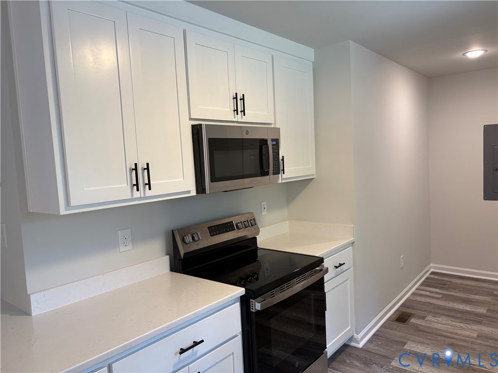 14002 Sunnybrook Road Petersburg, VA 23805 - Photo 2 of 21 Contemporary kitchen featuring white shaker cabine