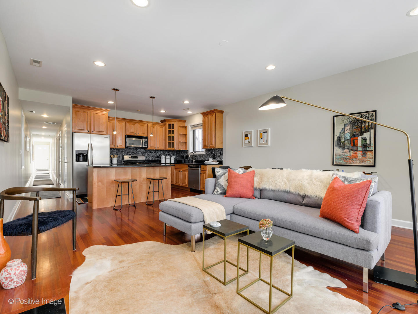 1704 South Morgan Street, Unit 2 Chicago, IL 60608 - Photo 2 of 18 a living room with furniture and kitchen view