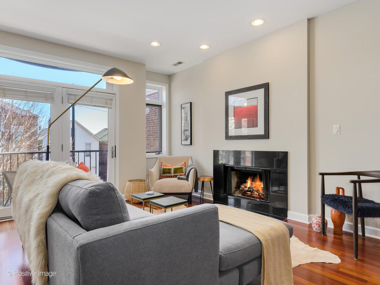 1704 South Morgan Street, Unit 2 Chicago, IL 60608 - Photo 12 of 18 a living room with furniture and a fireplace