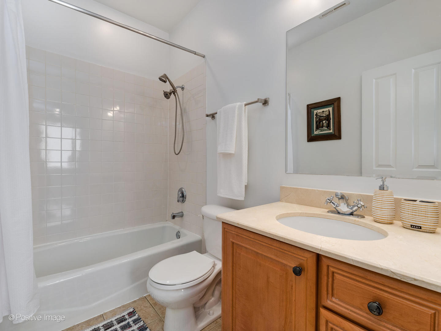 1704 South Morgan Street, Unit 2 Chicago, IL 60608 - Photo 17 of 18 a bathroom with a sink a toilet and a bathtub