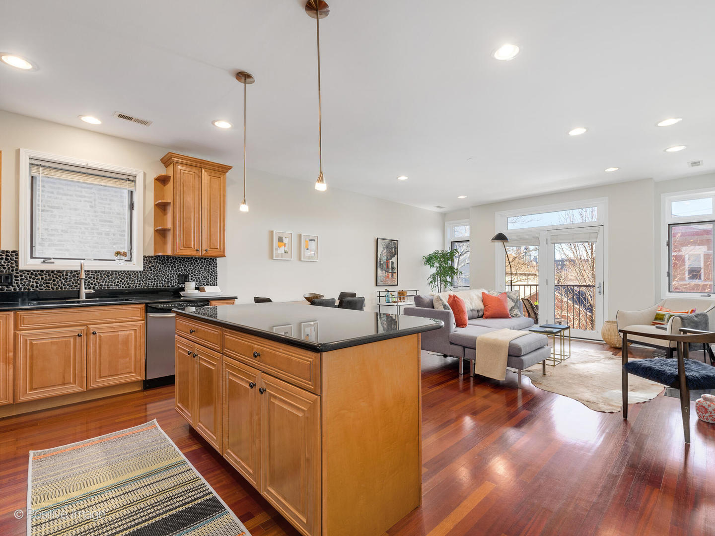 1704 South Morgan Street, Unit 2 Chicago, IL 60608 - Photo 6 of 18 a large white kitchen with lots of counter top space
